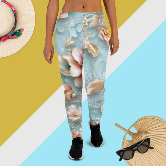 Aqua joggers with pastel floral and golden accents – elegant eco-friendly women’s sweatpants for refined summer style